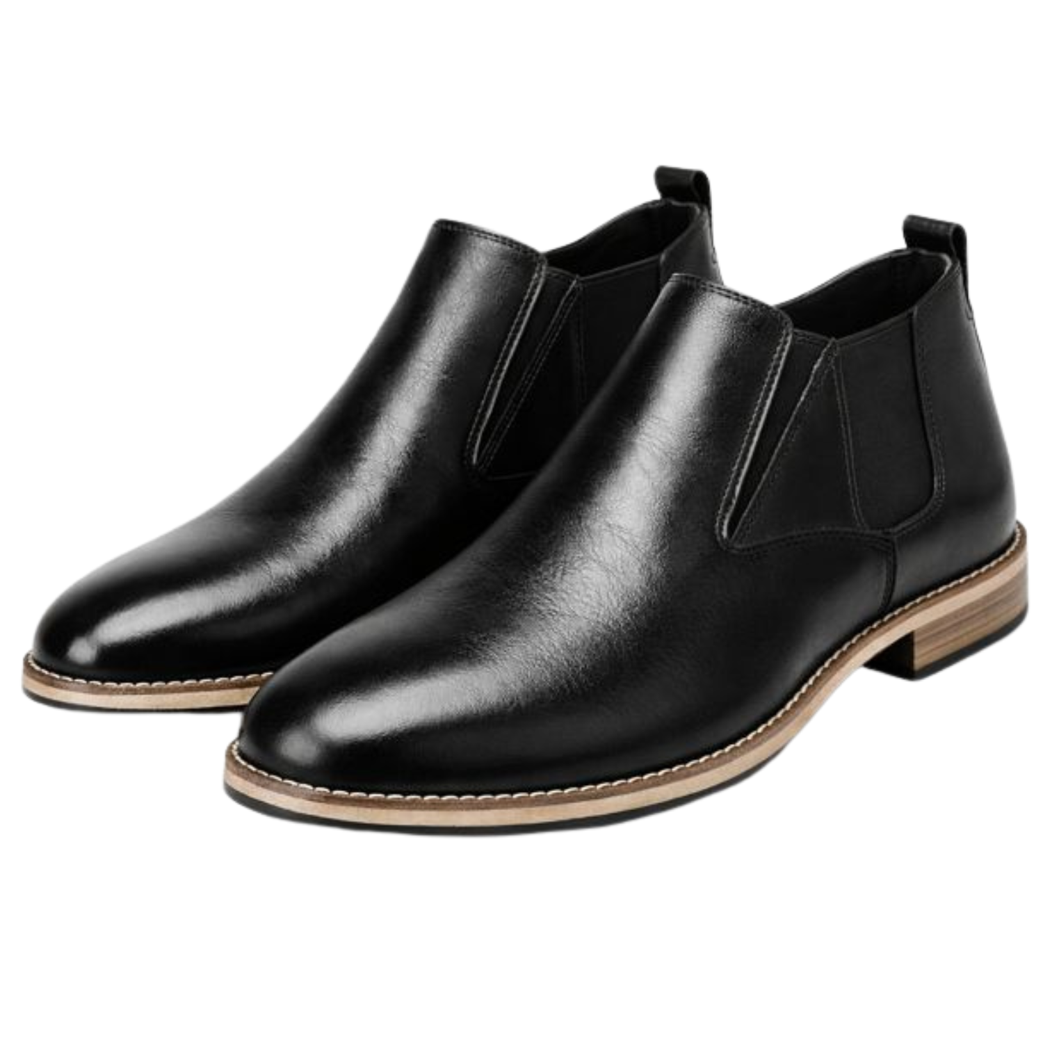 Pair of black leather Chelsea boots with elastic side panels and pull tabs, featuring a contrasting light brown welt and low stacked heel.