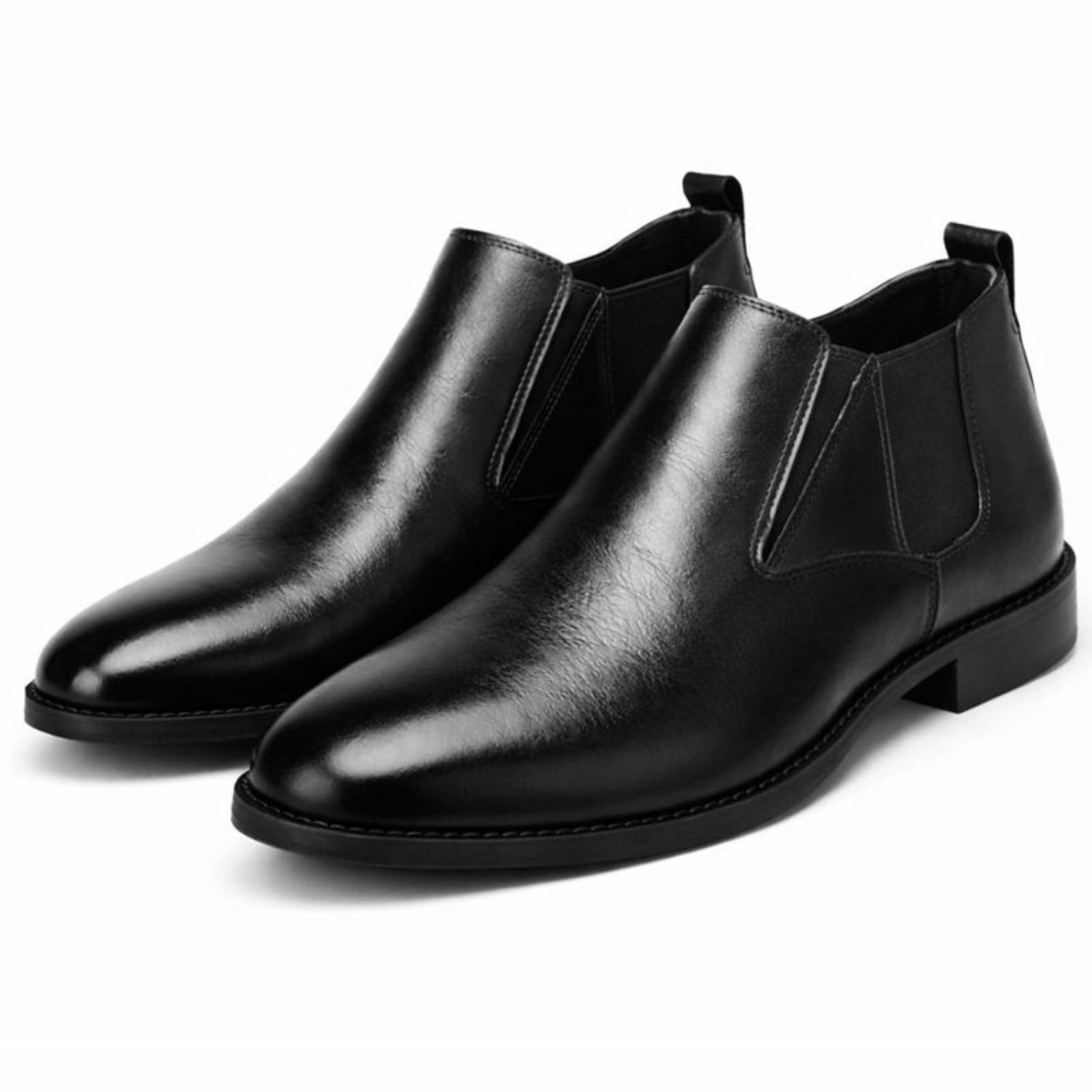 Pair of black leather Chelsea boots with smooth polished finish and elastic side panels on a white background.