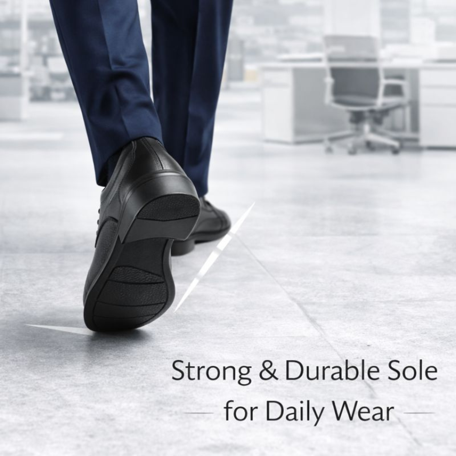 Rear view of a man walking in black formal leather shoes, highlighting the strong and durable rubber sole designed for daily wear.